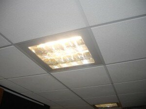 Glass panel under light fitting to keep conditioned air out of the ceiling cavity.